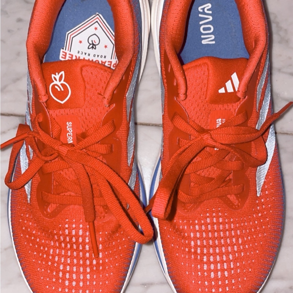 Adidas Red supernova  with White and Blue Details